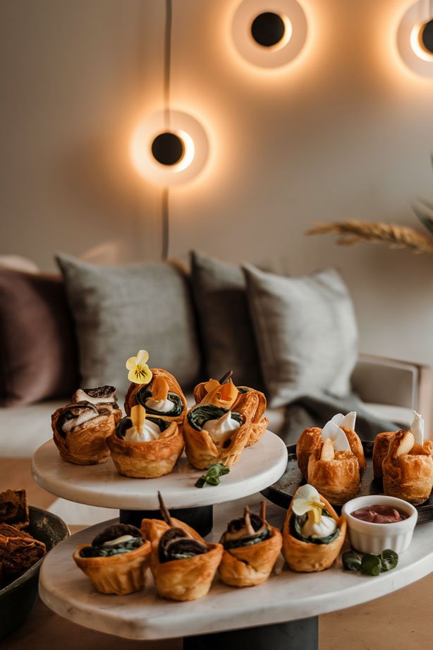 Puff pastry appetizers on serving board