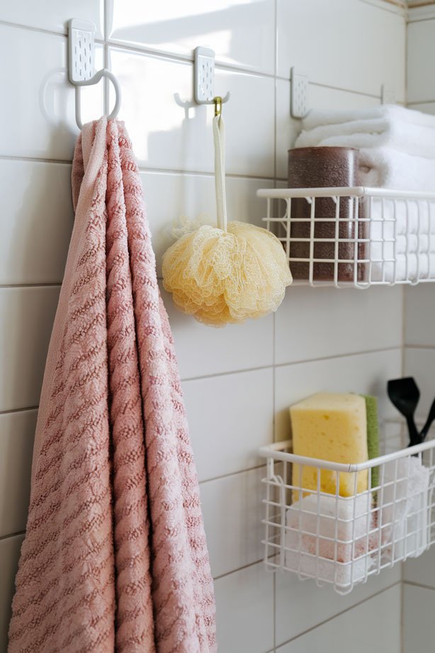 Bathroom with suction cup hooks.